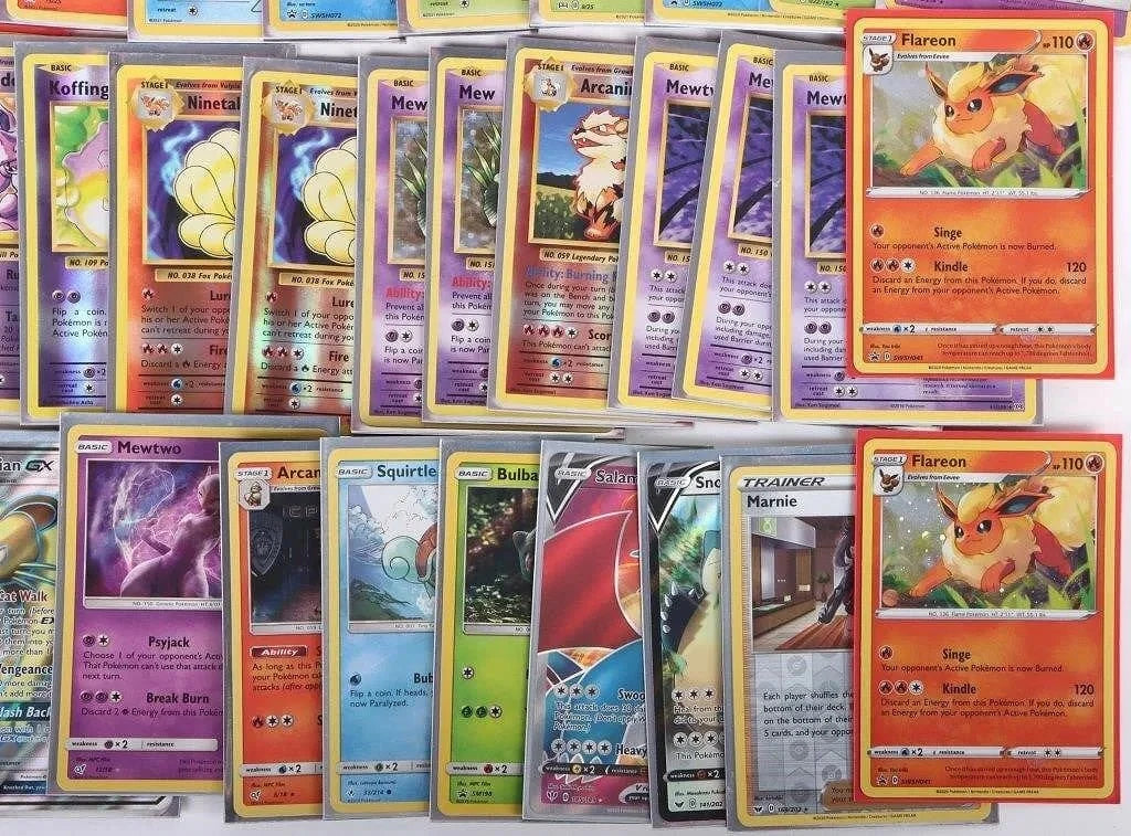 Bulk Pokémon trading cards lot featuring holo, rare, and assorted trainer, energy, and common cards in near-mint condition.