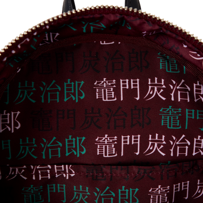 Interior view of Loungefly Demon Slayer Nezuko Kamado cosplay mini backpack showing printed character name pattern on fabric lining